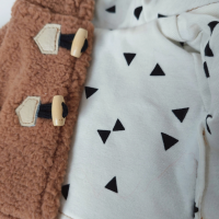 Brown and white coat