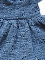 An apron dress with embroidery 