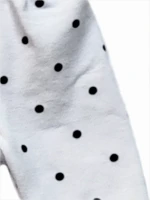 Black polka dot pattern leggings