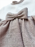 A glitter dress with a bow