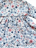 A long-sleeve floral pattern dress