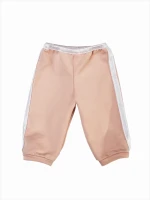 A pink tracksuit with fur