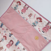 A suitcase with a hand-painted pattern