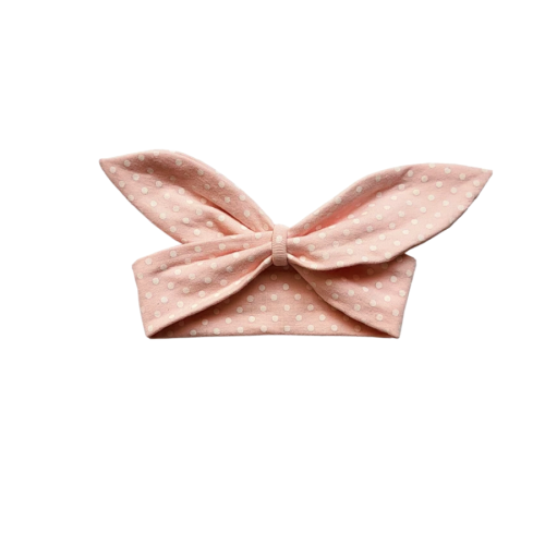A pink dotted headband