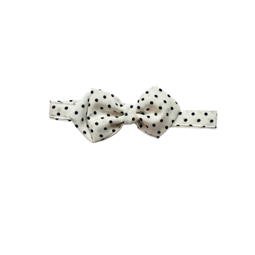 A black polka dot pattern headband