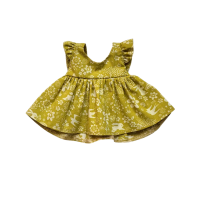 An apron dress with meadow pattern 